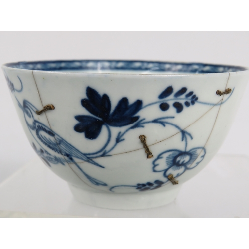 52 - 18th century Christian's Liverpool blue and white tea bowl and saucer decorated with bird and floral... 