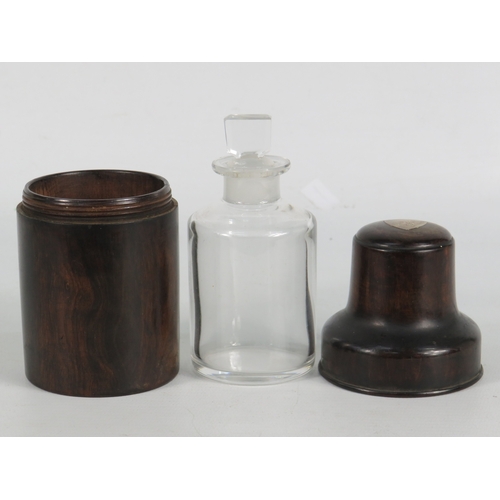 56 - Victorian French apothecary bottle in turned ebony case - 13cm high