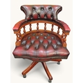 Traditional Chesterfield-style captain?s swivel chair upholstered in ...