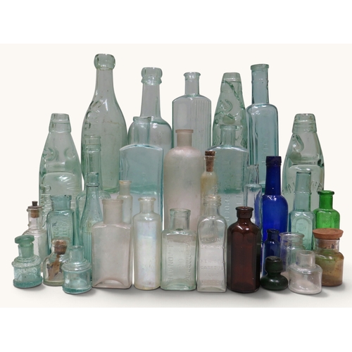 An extensive collection of antique and vintage glass bottles of ...