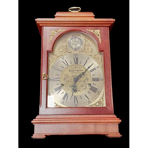 11 - A Heirloom English Style Mahogany Clock