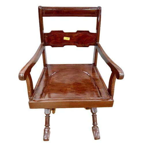 2 - A Cross Framed Armchair with Brass Inlay