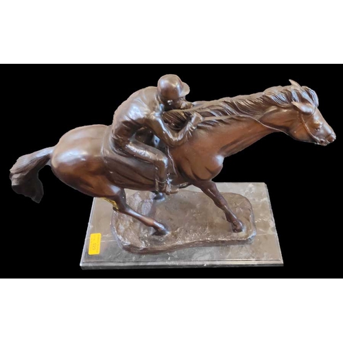 29 - A Bronze Figurine of a Racehorse