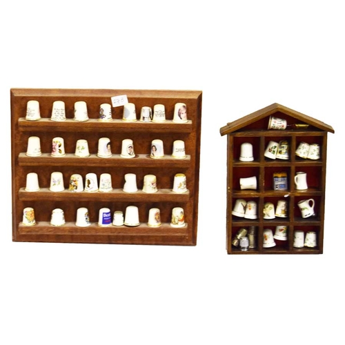 21 - Two Collections of Thimbles and Their Stands