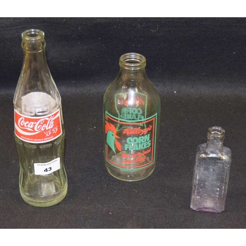 43 - A Kellogs Cornflake Bottle, A Coca Cola Bottle and another Bottle