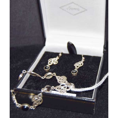 559 - A Silver Bracelet and Set of Matching Earrings