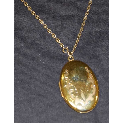 564 - A Very Nice 9ct Gold Chain and Locket