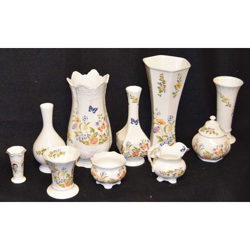 94 - A Collection of Aynsley (two shelves) and a Charles and Diana Vase