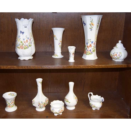 94 - A Collection of Aynsley (two shelves) and a Charles and Diana Vase