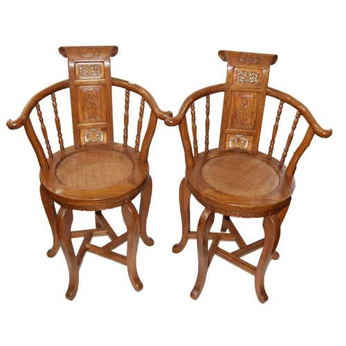 135 - A Pair of Chinese Tub Chairs