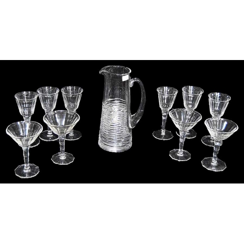 148 - A Jasper Conran Stuart Crystal Jug, Six Wine Glasses and Four Champagne Glasses