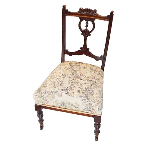 55 - A Mahogany Framed Nursing Chair