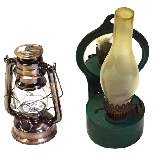 38 - An Old Oil Lamp and a Modern Storm Lamp