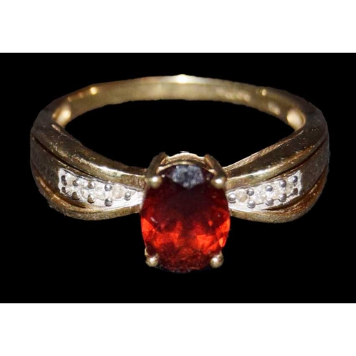 632 - A 9ct Gold and Garnet Ring