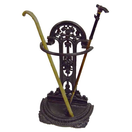 142 - A Very Good Cast Metal Stick Stand and Contents