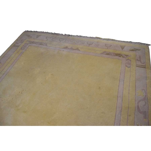 260a - A Large Rectangular Cream Floor Rug