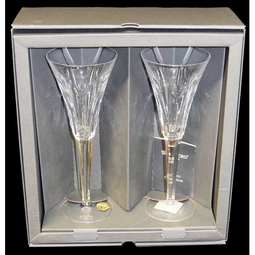 93 - A Pair of Waterford Crystal Champagne Flutes in Original Box