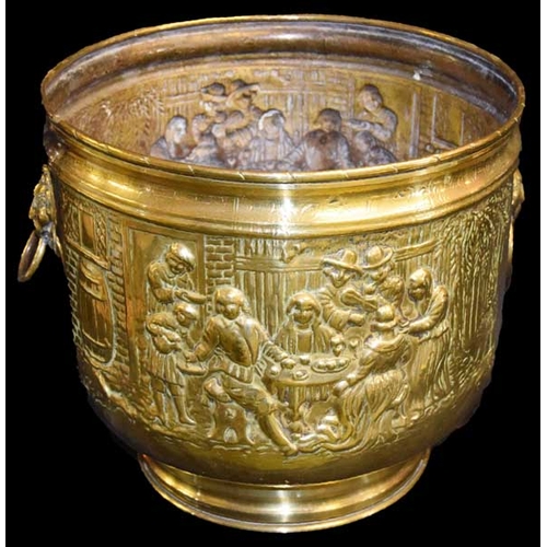 657 - An Embossed Brass Two Handled Planter