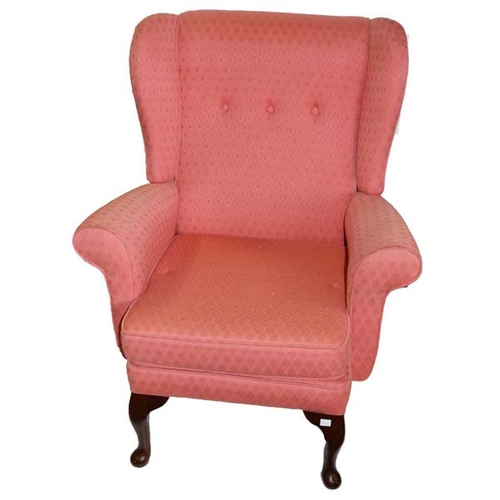 660 - A Nice Upholstered Wing Backed Armchair