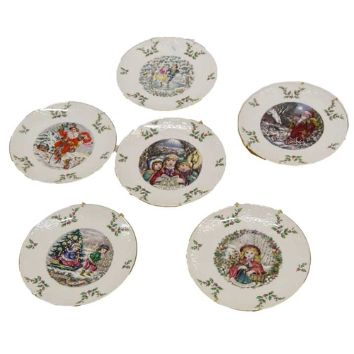 106 - A Set of Six Royal Doulton Christmas Plates