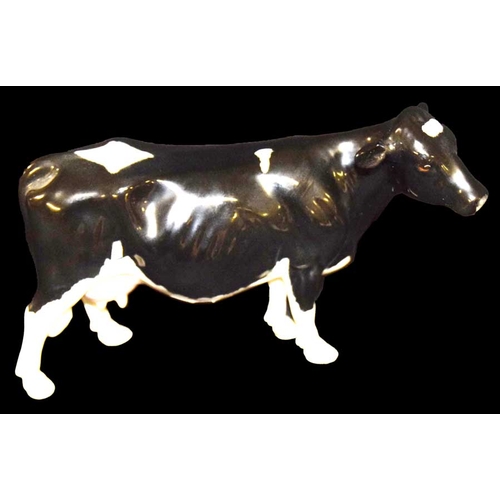 116 - A Beswick Figurine of a 'Friesian Cow'