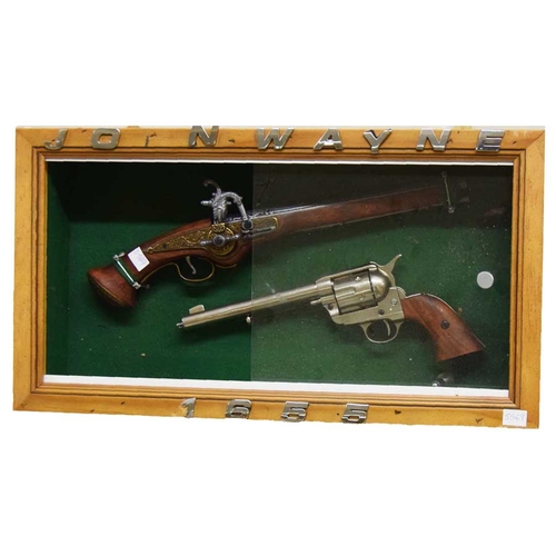 70 - A Pistol and Gun in Display Cabinet