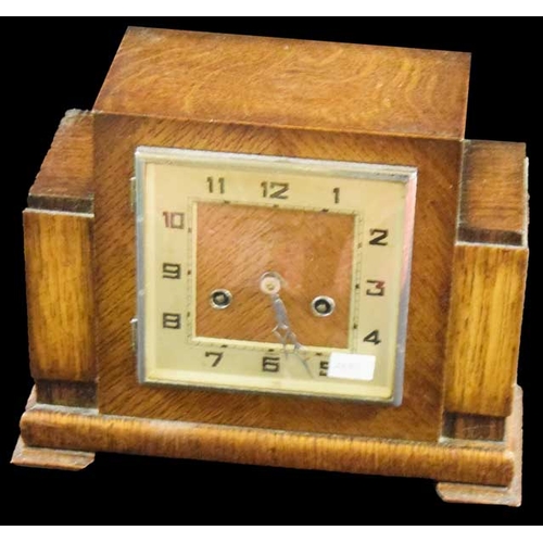 192 - An Oak Cased Mantle Clock