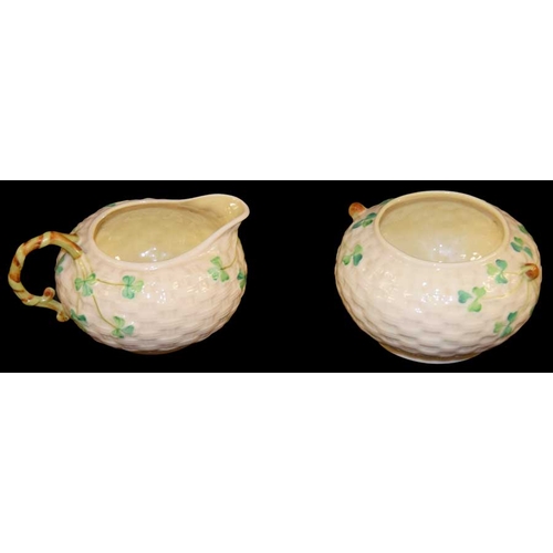 269 - A 3rd Period Belleek Shamrock Patterned Jug and Sugar