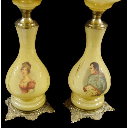 77 - An Unusual Pair of Glass and Gilted Metal Oil Lamps 'Napoleon and Cleopatra'