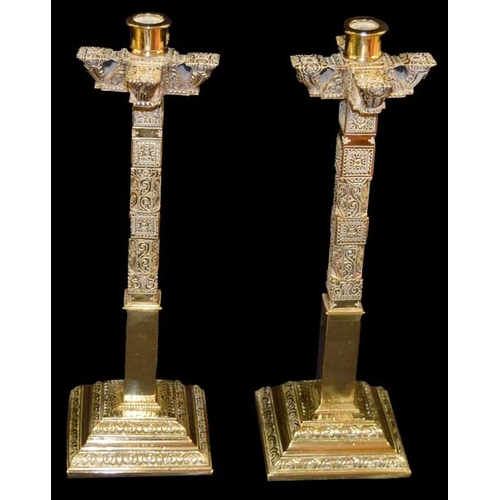 99 - A Very Unusual Pair of Heavy Brass Candlesticks