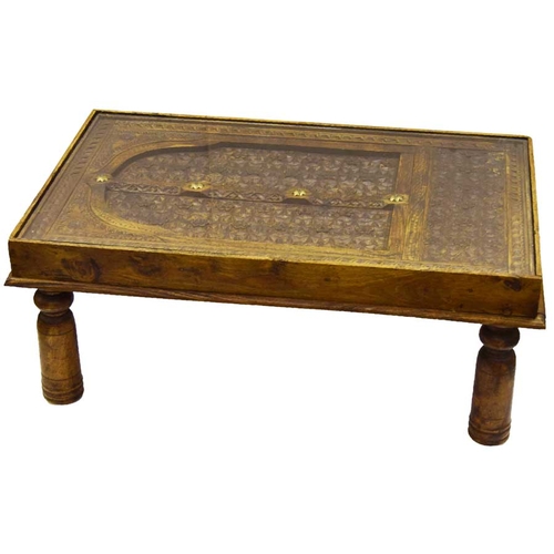 68 - A Very Unusual Carved Top Coffee Table