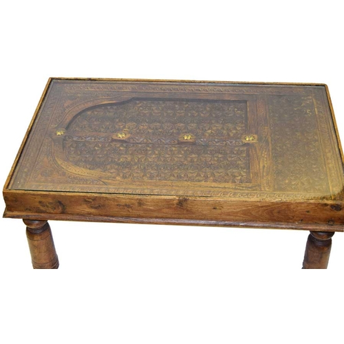 68 - A Very Unusual Carved Top Coffee Table