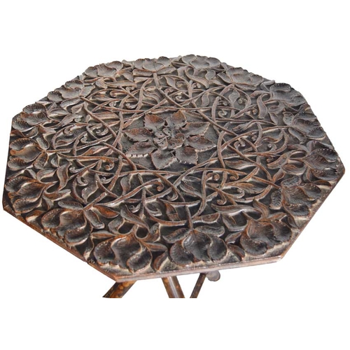 9 - A Bamboo Tripod Carved Top Table