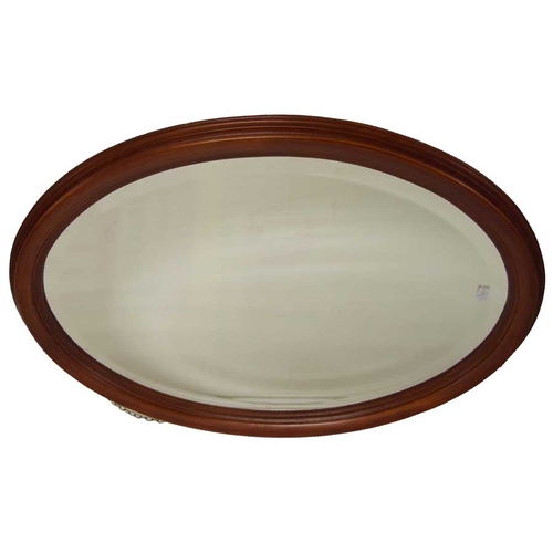 15 - An Oval Bevelled Glass Wall Mirror