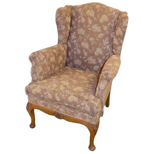 63 - A Good Upholstered Wingbacked Armchair