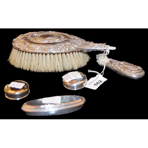 562 - Three Dressing Table Bottle Tops and a Silver Backed Hairbrush a/f