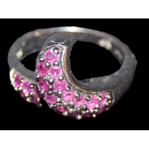 511 - A Silver Ring Set with Rubies