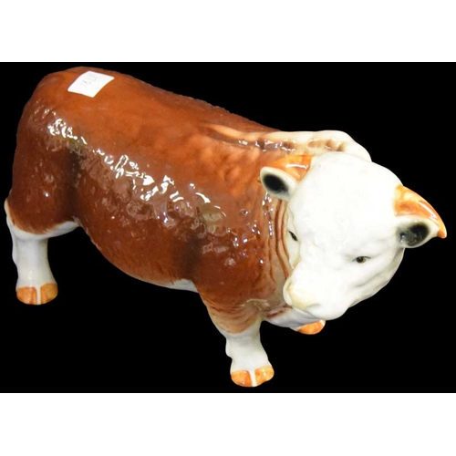 147 - An Ornamental Figurine of a Bull