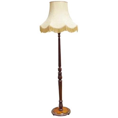 194 - A Mahogany Standard Lamp and Shade