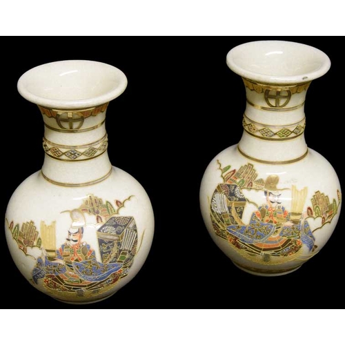 25 - A Pair of Oriental Vases