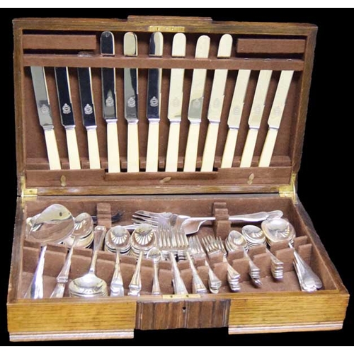 27 - A Good Oak Cased Canteen of Cutlery