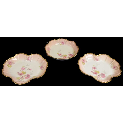 296 - A Set of Three Limoges Dessert Dishes