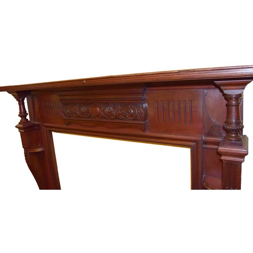 46 - A Carved Mahogany Fire Surround