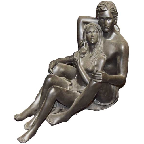 63 - A Bronzed Figurine 'At Ease'