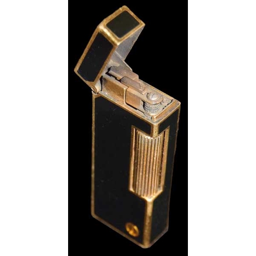 803 - A Vintage Gold Plated and Black Lacquer Dunhill Lighter