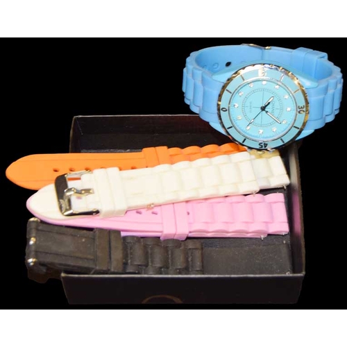 746 - A Ladies Wrist Watch With Four Coloured Straps