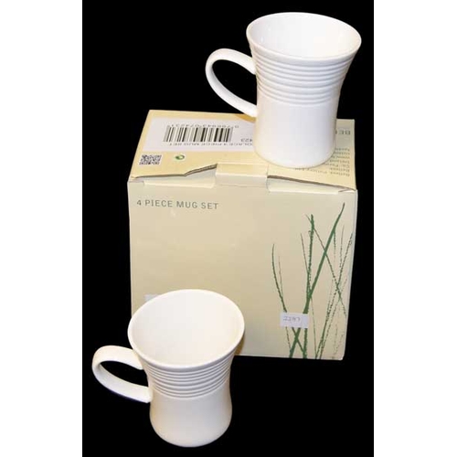 19 - A Belleek Four Piece Mug Set