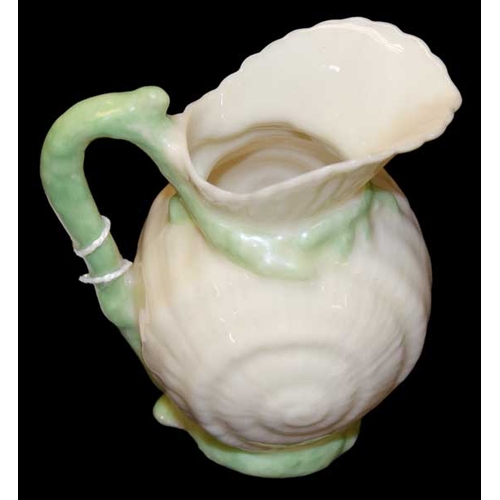 411 - A 2nd Period Belleek Green Shell Jug