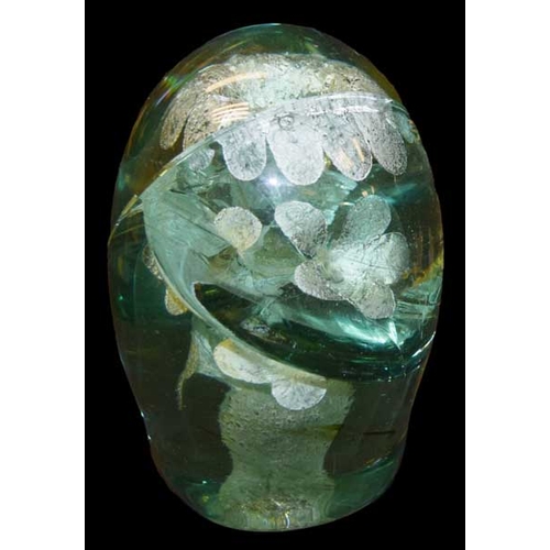 423 - An Antique Green Glass Paperweight