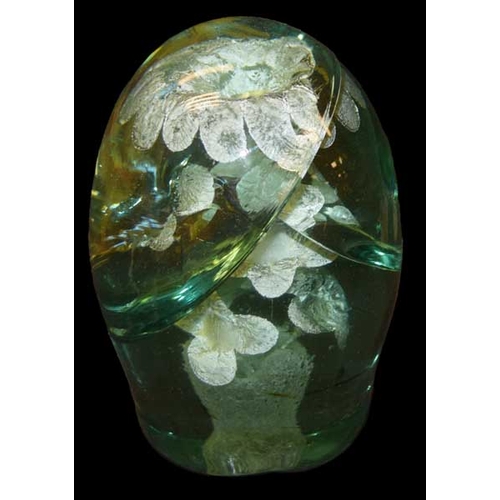 423 - An Antique Green Glass Paperweight